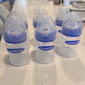 6 Lansinoh slow flow 5 oz bottles